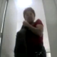 An Eastern-European bowlcam video production featuring a middle age, Asian-looking woman pooping into a public floor toilet. The Russians and Japanese both use floor toilets, unlike the West. Over 7 minutes.